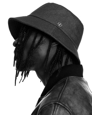 model-wearing-undercontrol-overfit-denim-bucket-hat-black-and-white-photo