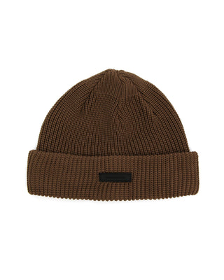 Fisherman beanie on a wooden table