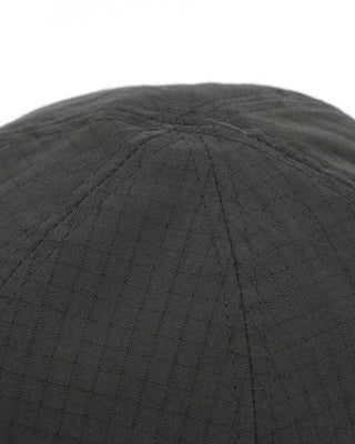 Adjustable ball cap showcasing the strap