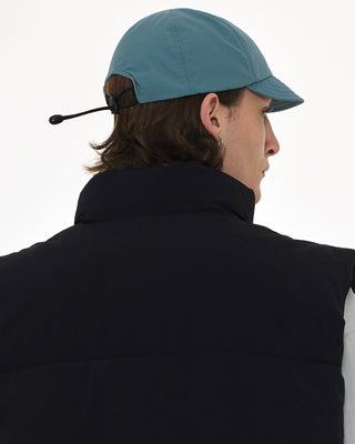 Compact foldable cap in a pocket