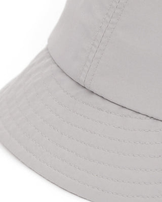 Sun-protective cap worn during hiking