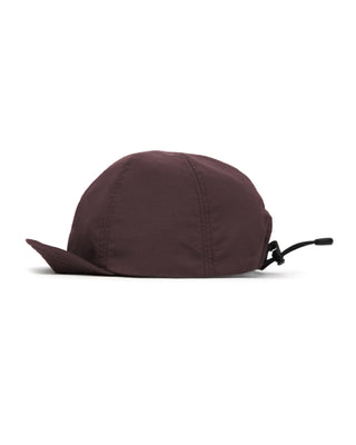 Baseball cap with short visor on a picnic