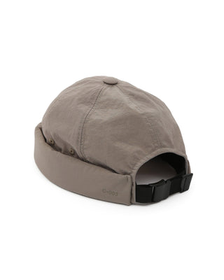 Brimless cap in a natural outdoor setting