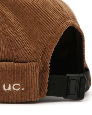 An outdoor Leon beanie paired with a winter jacket.