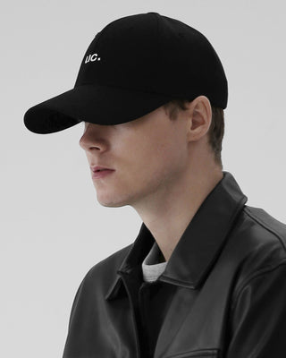 A cap featuring a hard top for a bold and structured appearance.