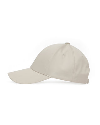 A structured cap with a firm top, offering a distinct style.