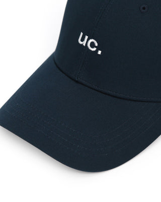 A cap designed with a long visor to shield from the sun.