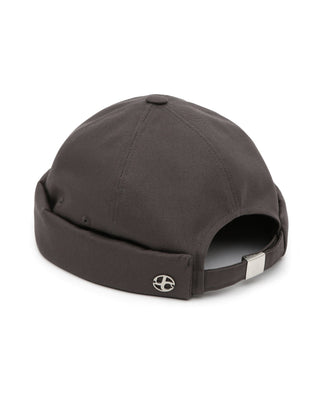 Minimalist brimless cap for a sleek look.