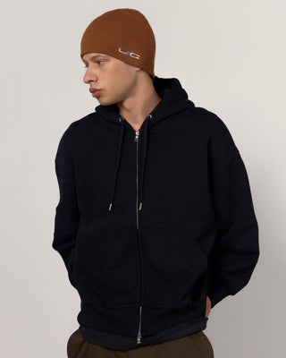 Beanie styled with a leather jacket